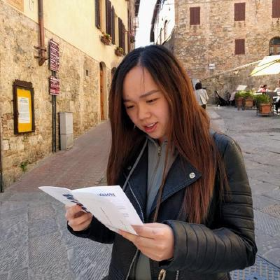 Picture of Sze Tyng looking confused while reading a map